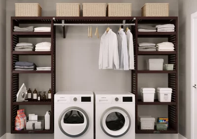shelves organized around a washing machine and dryer